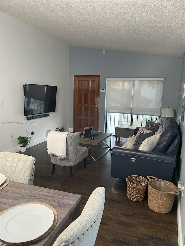 7525 SW 153rd Pl Unit 203-11, Miami, FL 33193 - living area with wood finished floors and a textured ceiling