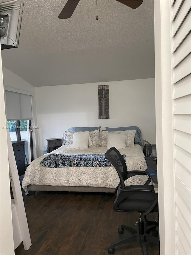 7525 SW 153rd Pl Unit 203-11, Miami, FL 33193 - bedroom with wood finished floors, a ceiling fan, lofted ceiling, and a textured ceiling