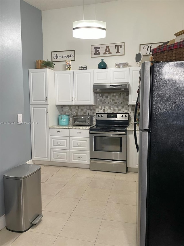 7525 SW 153rd Pl Unit 203-11, Miami, FL 33193 - kitchen with stainless steel appliances, under cabinet range hood, white cabinets, and decorative backsplash