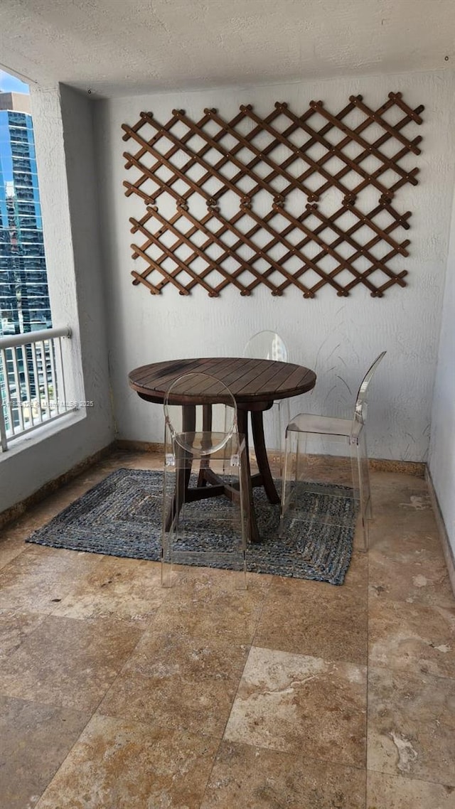 170 SE 14th St Unit 2405, Miami, FL 33131 - unfurnished dining area with a textured ceiling
