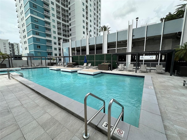 1010 SW 2nd Ave Unit Ph06, Miami, FL 33130 - community pool featuring a patio