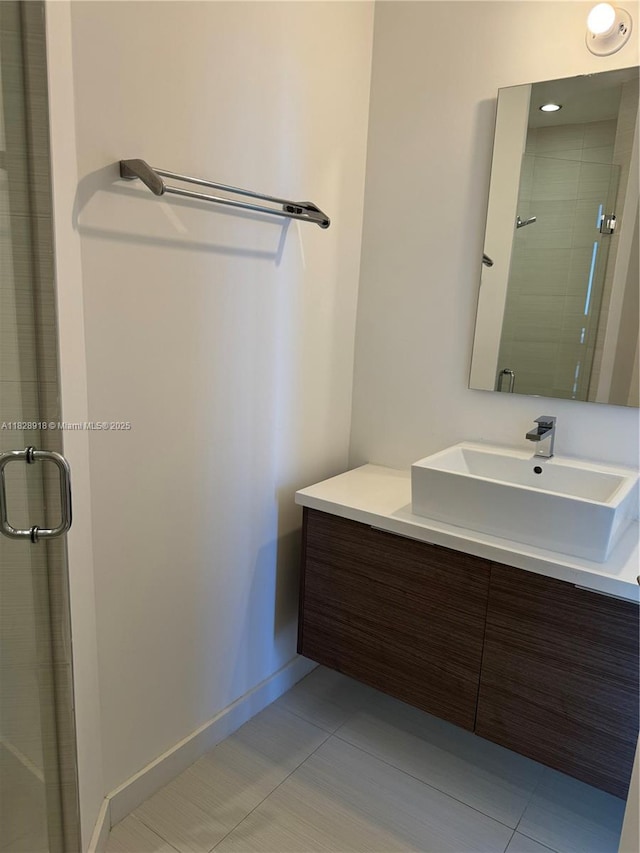 1010 SW 2nd Ave Unit Ph06, Miami, FL 33130 - bathroom featuring a shower stall, vanity, and tile patterned floors