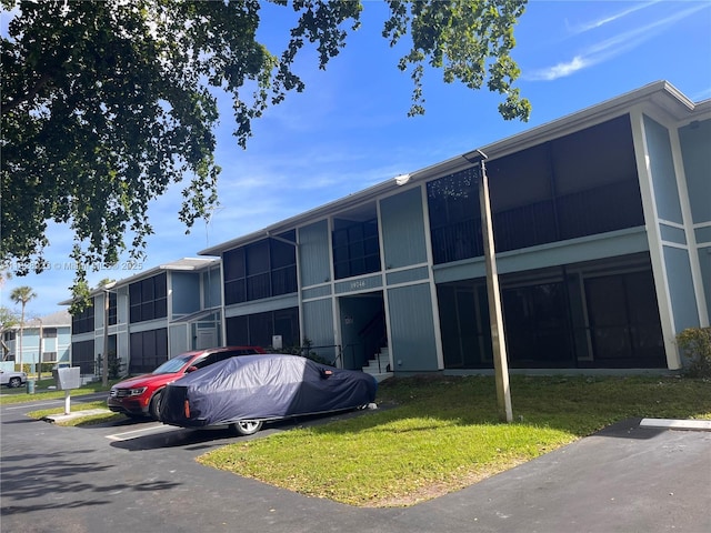 19740 SW 103rd Ct Unit 108, Cutler Bay, FL 33157 - view of property with uncovered parking