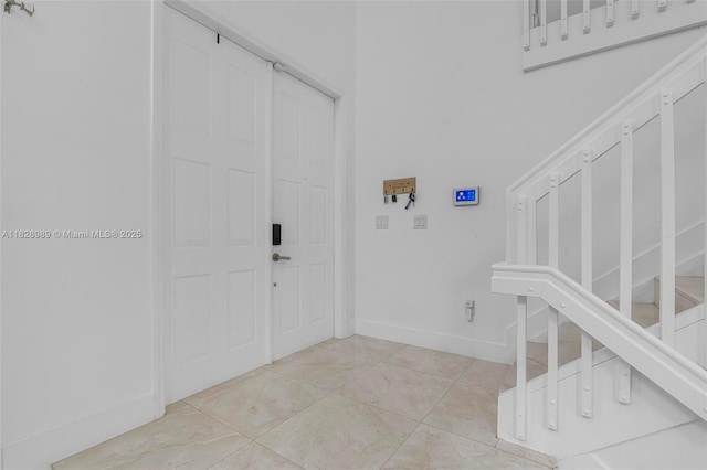 2620 SW 150th Ct, Miami, FL 33185 - entrance foyer with baseboards and light tile patterned floors