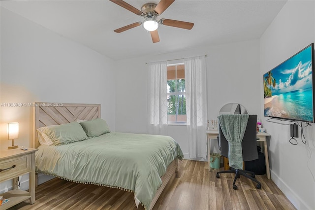 2620 SW 150th Ct, Miami, FL 33185 - bedroom with wood finished floors and a ceiling fan