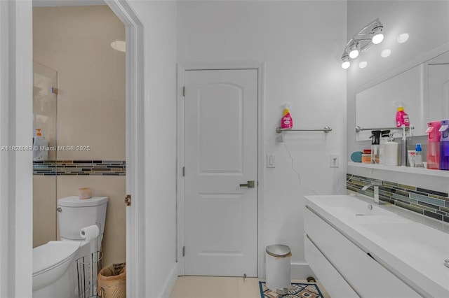 2620 SW 150th Ct, Miami, FL 33185 - bathroom with vanity, tasteful backsplash, and tile patterned flooring