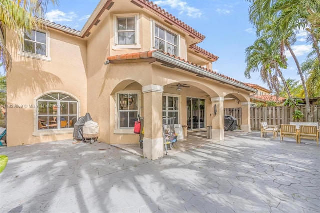 2620 SW 150th Ct, Miami, FL 33185 - rear view of property with a patio area, a tile roof, and stucco siding