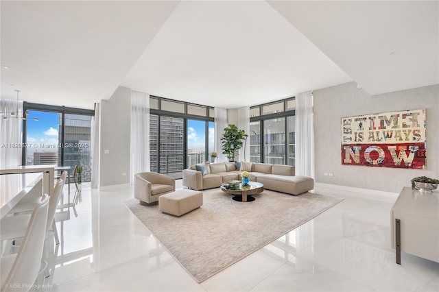 88 SW 7th St Unit 4101, Miami, FL 33130 - living area with floor to ceiling windows and baseboards