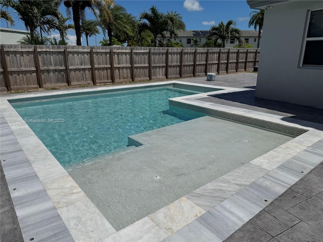 1433 SE 27th Ter, Homestead, FL 33035 - view of swimming pool with a patio