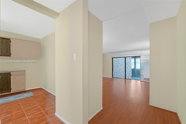 4000 NW 44th Ave Unit 203, Lauderdale Lakes, FL 33319 - hall featuring wood finished floors and baseboards