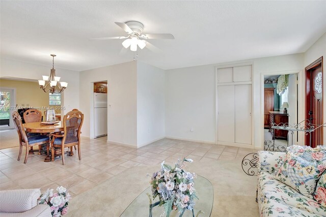 16702 NW 73rd Ct, Hialeah, FL 33015 - living area with a chandelier, ceiling fan, and light tile patterned floors