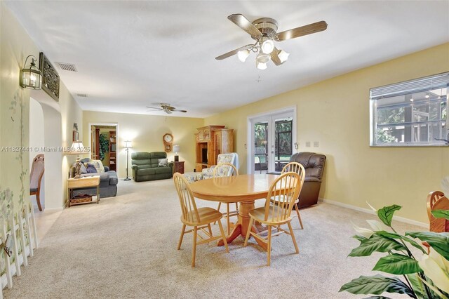16702 NW 73rd Ct, Hialeah, FL 33015 - dining area with light carpet and a ceiling fan