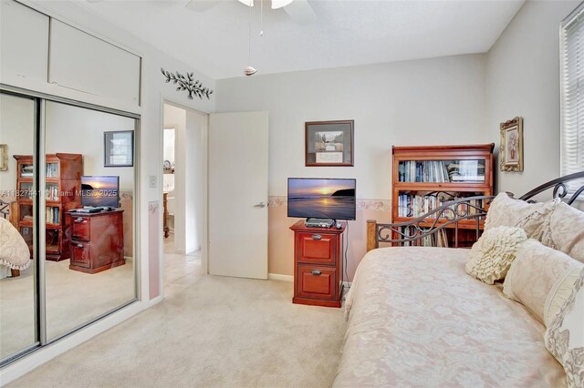 16702 NW 73rd Ct, Hialeah, FL 33015 - bedroom with carpet floors, a closet, and a ceiling fan