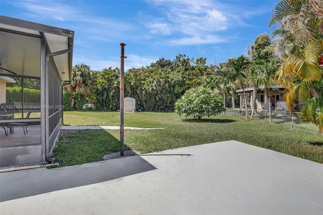 16702 NW 73rd Ct, Hialeah, FL 33015 - view of yard with a patio area and a shed
