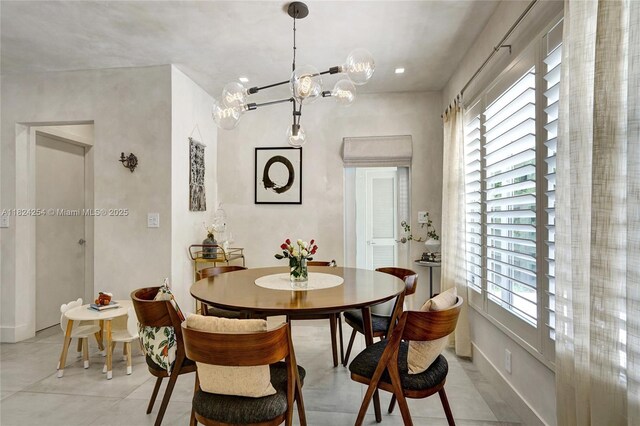 1330 Harrison St, Hollywood, FL 33019 - dining area featuring a chandelier