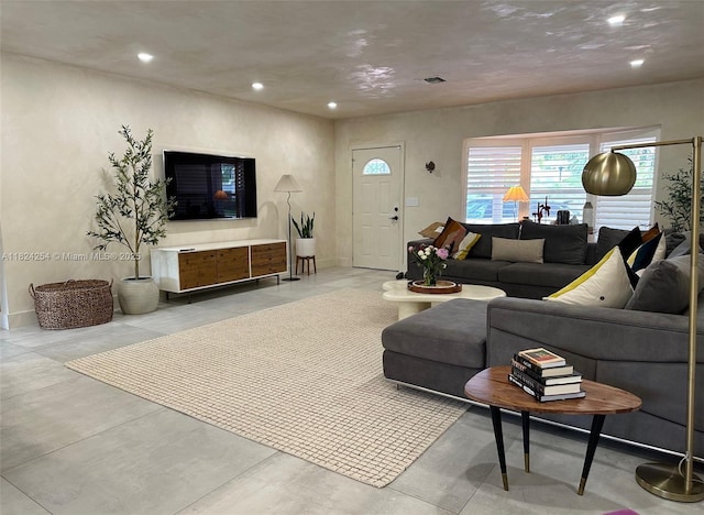 1330 Harrison St, Hollywood, FL 33019 - living room featuring recessed lighting and concrete flooring