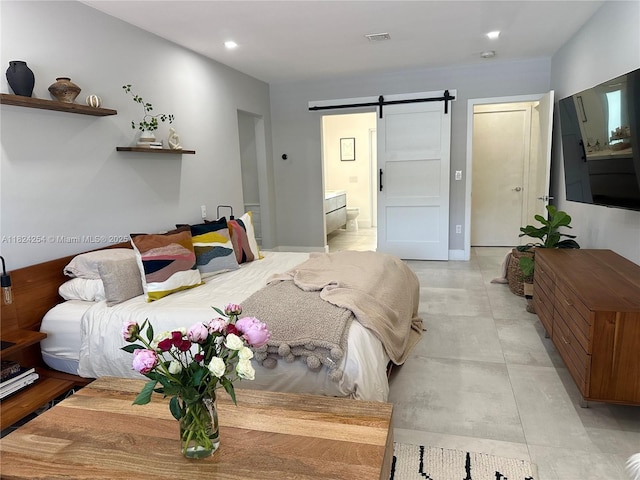 1330 Harrison St, Hollywood, FL 33019 - bedroom featuring a barn door, recessed lighting, and ensuite bath