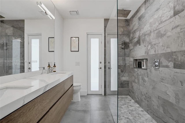 1330 Harrison St, Hollywood, FL 33019 - bathroom featuring tiled shower and double vanity