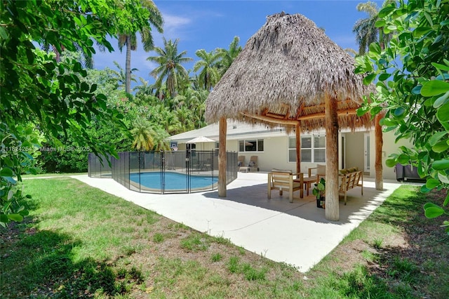 1330 Harrison St, Hollywood, FL 33019 - rear view of property with a patio area, stucco siding, and a gazebo