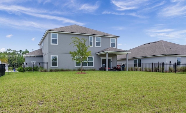 365 Cedarstone Way, Saint Augustine, FL 32092 - rear view of house with stucco siding, a fenced backyard, and roof with shingles