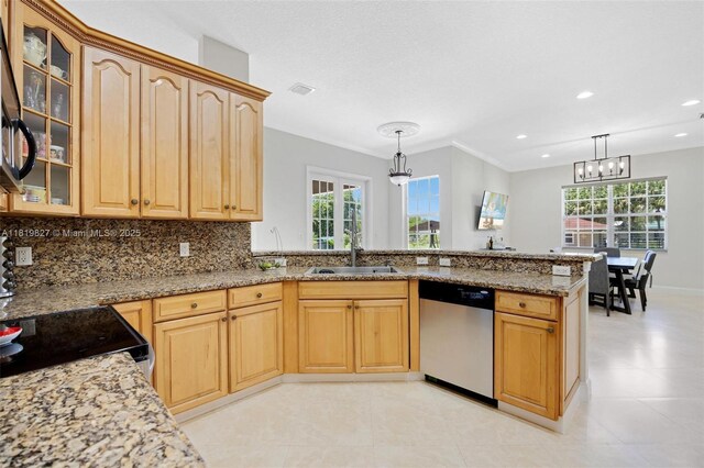 12851 Luray Rd, Southwest Ranches, FL 33330 - kitchen with dishwasher, a chandelier, light stone counters, plenty of natural light, and recessed lighting