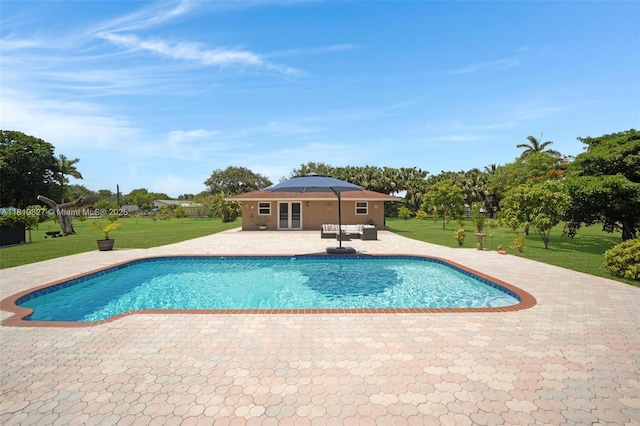 12851 Luray Rd, Southwest Ranches, FL 33330 - outdoor pool with a patio, a lawn, and french doors