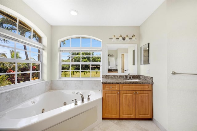 12851 Luray Rd, Southwest Ranches, FL 33330 - full bathroom with a jetted tub, vanity, and tile patterned floors