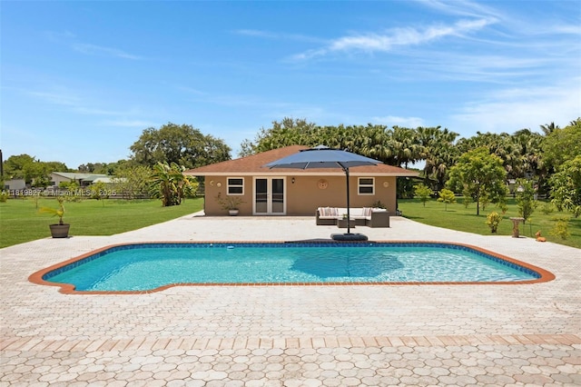 12851 Luray Rd, Southwest Ranches, FL 33330 - outdoor pool with a patio area, a lawn, and an outdoor living space