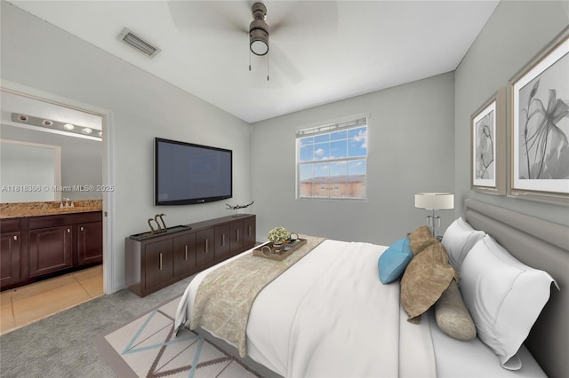 14776 SW 10th St Unit 10501, Pembroke Pines, FL 33027 - bedroom with ensuite bathroom, light colored carpet, a ceiling fan, and light tile patterned floors