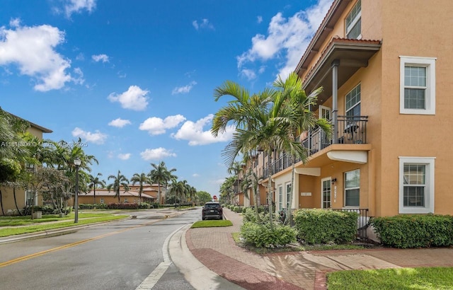 14776 SW 10th St Unit 10501, Pembroke Pines, FL 33027 - view of asphalt street featuring sidewalks and curbs
