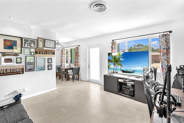 412 S 24th Ave, Hollywood, FL 33020 - living room with ceiling fan and speckle patterned floor