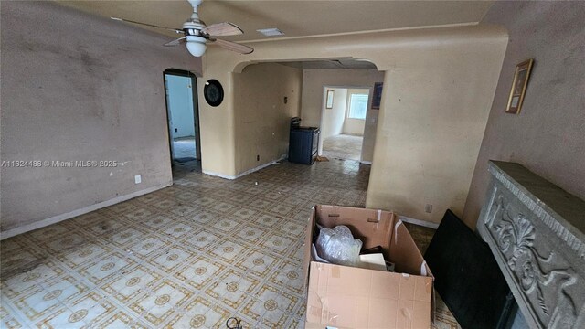 1710 SW 13th St, Miami, FL 33145 - living room featuring arched walkways and ceiling fan