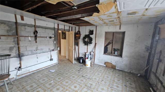 1710 SW 13th St, Miami, FL 33145 - unfinished basement with tile patterned floors