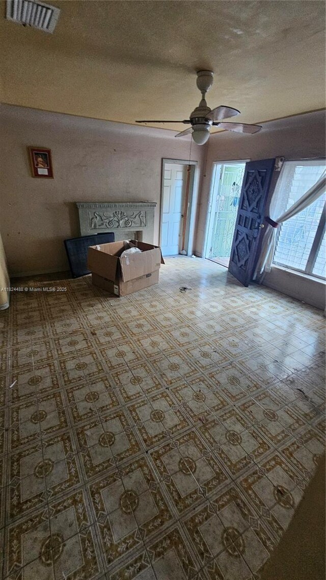 1710 SW 13th St, Miami, FL 33145 - unfurnished living room with a ceiling fan