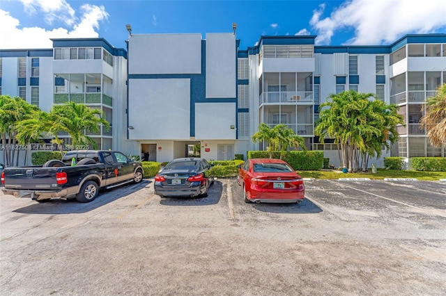9159 SW 77th Ave Unit 314, Miami, FL 33156 - view of building exterior featuring uncovered parking