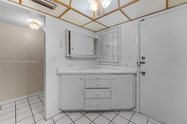 9159 SW 77th Ave Unit 314, Miami, FL 33156 - bathroom featuring tile patterned floors and baseboards