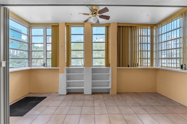 9159 SW 77th Ave Unit 314, Miami, FL 33156 - unfurnished sunroom featuring tile patterned flooring