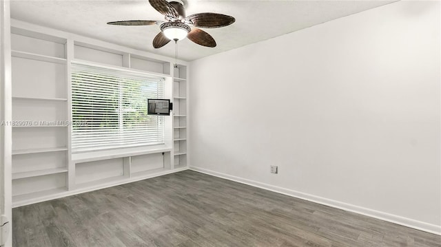 1482 SE Manth Ln, Port St Lucie, FL 34983 - empty room with ceiling fan, wood finished floors, and a textured ceiling