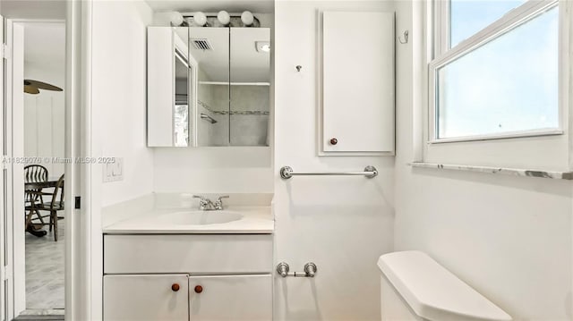 1482 SE Manth Ln, Port St Lucie, FL 34983 - bathroom featuring healthy amount of natural light and vanity