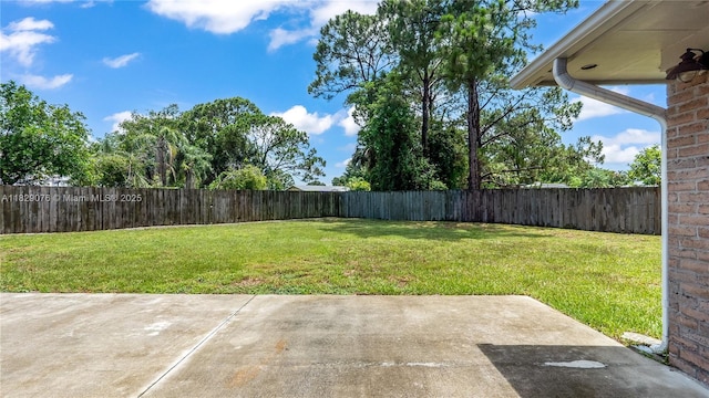 1482 SE Manth Ln, Port St Lucie, FL 34983 - fenced backyard with a patio area