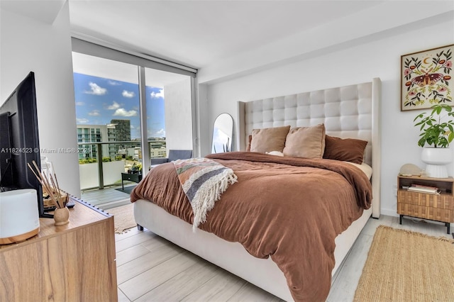 4250 Biscayne Blvd Unit 1217, Miami, FL 33137 - bedroom with access to outside and expansive windows