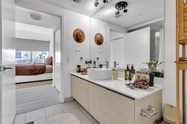 4250 Biscayne Blvd Unit 1217, Miami, FL 33137 - ensuite bathroom featuring vanity and tile patterned floors