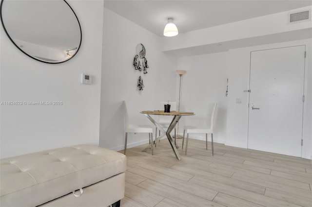 4250 Biscayne Blvd Unit 1217, Miami, FL 33137 - dining area featuring light wood-style flooring and baseboards