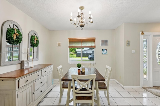 1321 NW 75th Ter, Plantation, FL 33313 - dining area featuring a chandelier, a textured ceiling, and light tile patterned floors