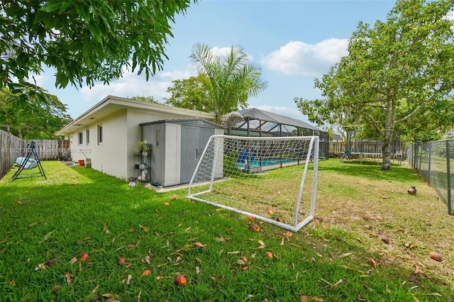 1321 NW 75th Ter, Plantation, FL 33313 - fenced backyard with a storage unit and a gazebo