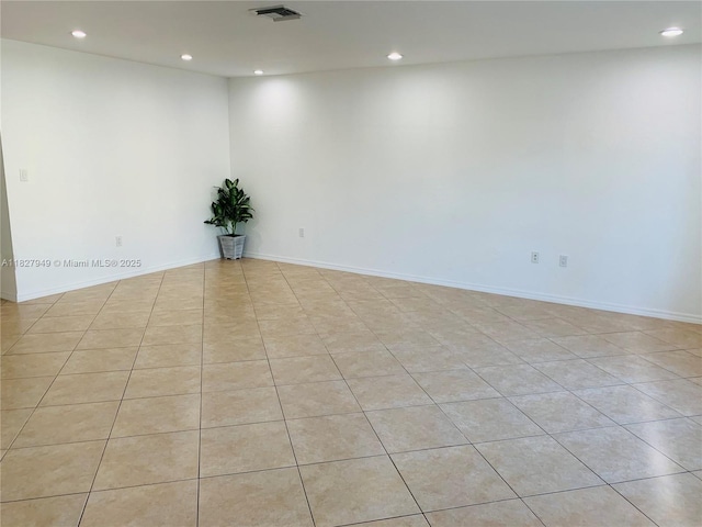 5907 Glasgow Way, Tamarac, FL 33321 - spare room with recessed lighting and light tile patterned flooring