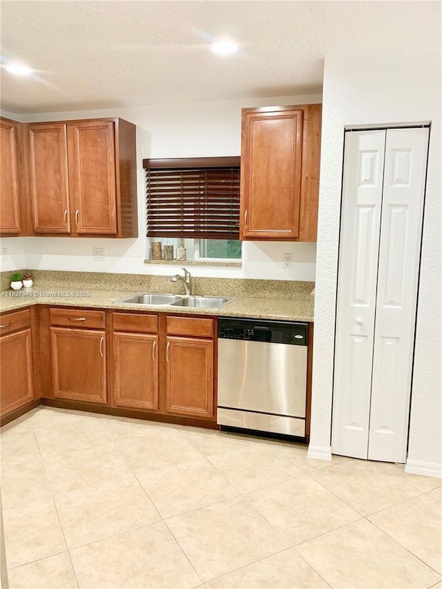 5907 Glasgow Way, Tamarac, FL 33321 - kitchen featuring dishwasher, brown cabinets, and light tile patterned floors