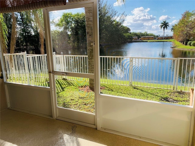 5907 Glasgow Way, Tamarac, FL 33321 - unfurnished sunroom with a water view