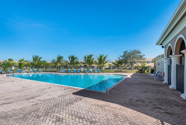 5907 Glasgow Way, Tamarac, FL 33321 - community pool featuring a patio area