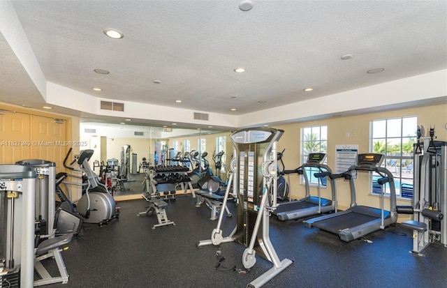 5907 Glasgow Way, Tamarac, FL 33321 - gym with a textured ceiling and recessed lighting